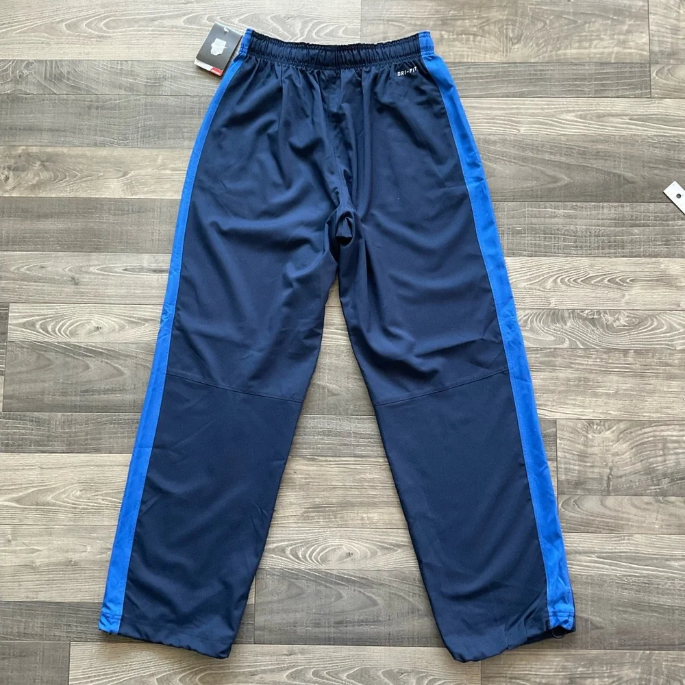 NWT Nike Team Woven Dri Fit Training Pants Men’s MEDIUM Blue Cord Hem 377786-451
